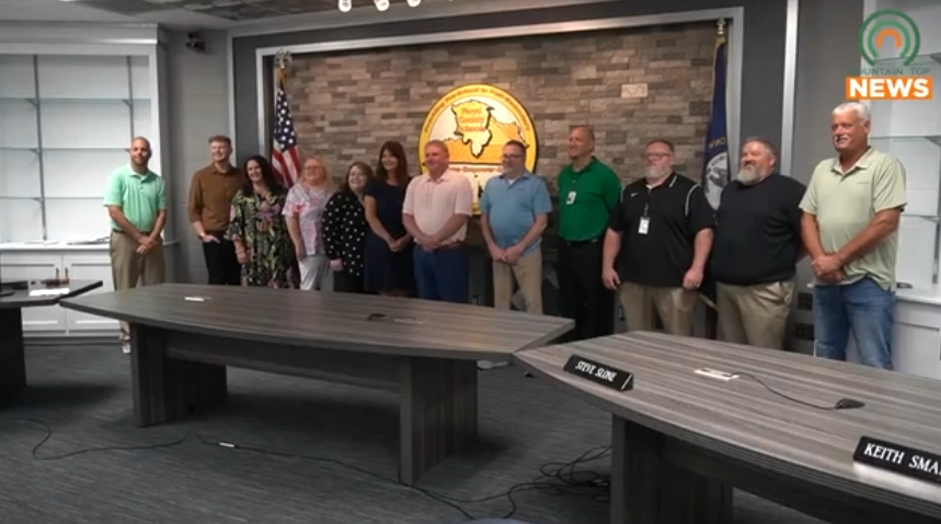 Floyd County officials give money to school board to help drug-impacted families, schools